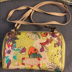 Sakroots wallet with cross body handle